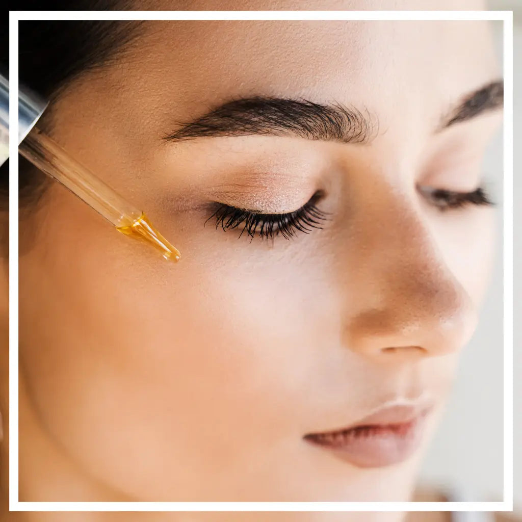 lady applying scars serum